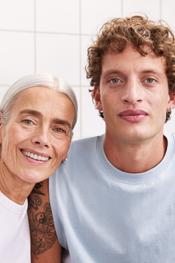 A woman and a man staring to the camera, with nice and bright skin
