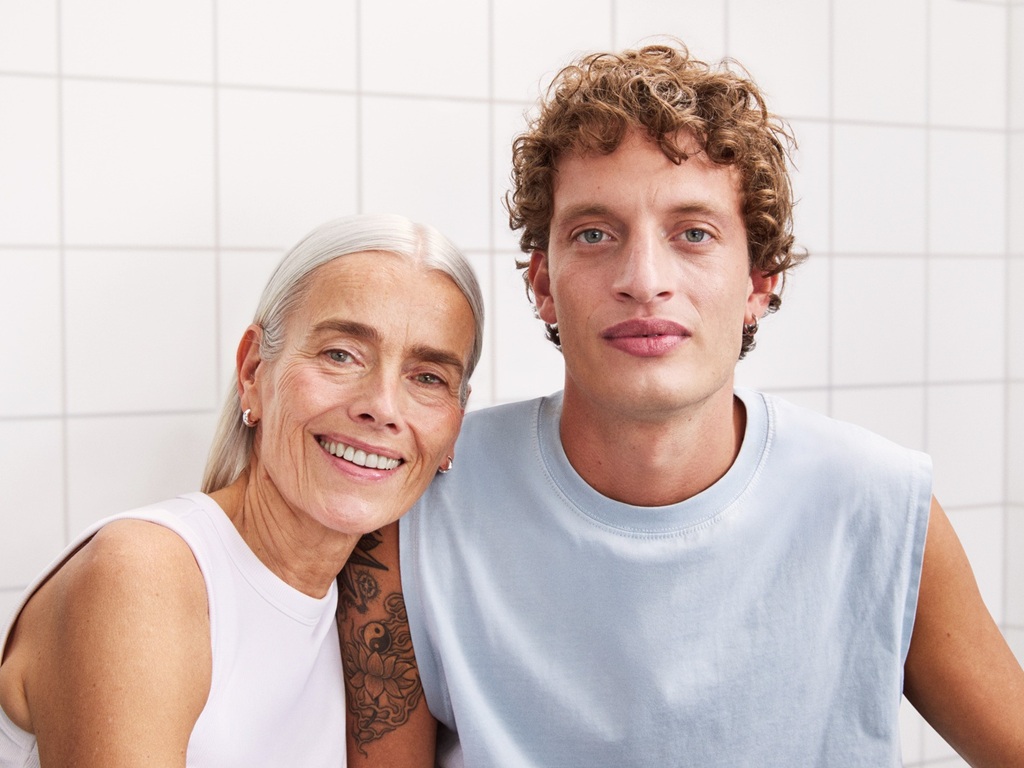 A woman and a man staring to the camera, with nice and bright skin