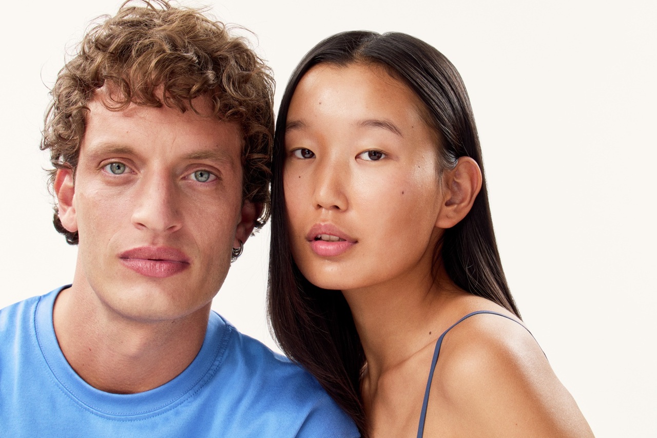 A woman and a man staring to the camera, with nice and bright skin