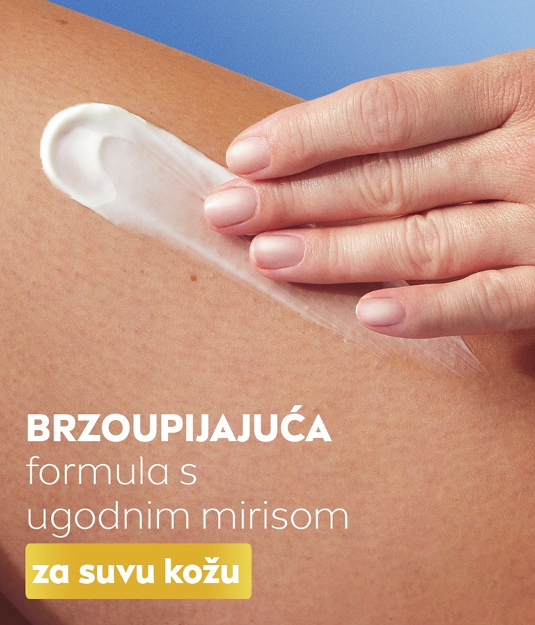 A hand swipes Q10 lotion which has fast absorbing formula