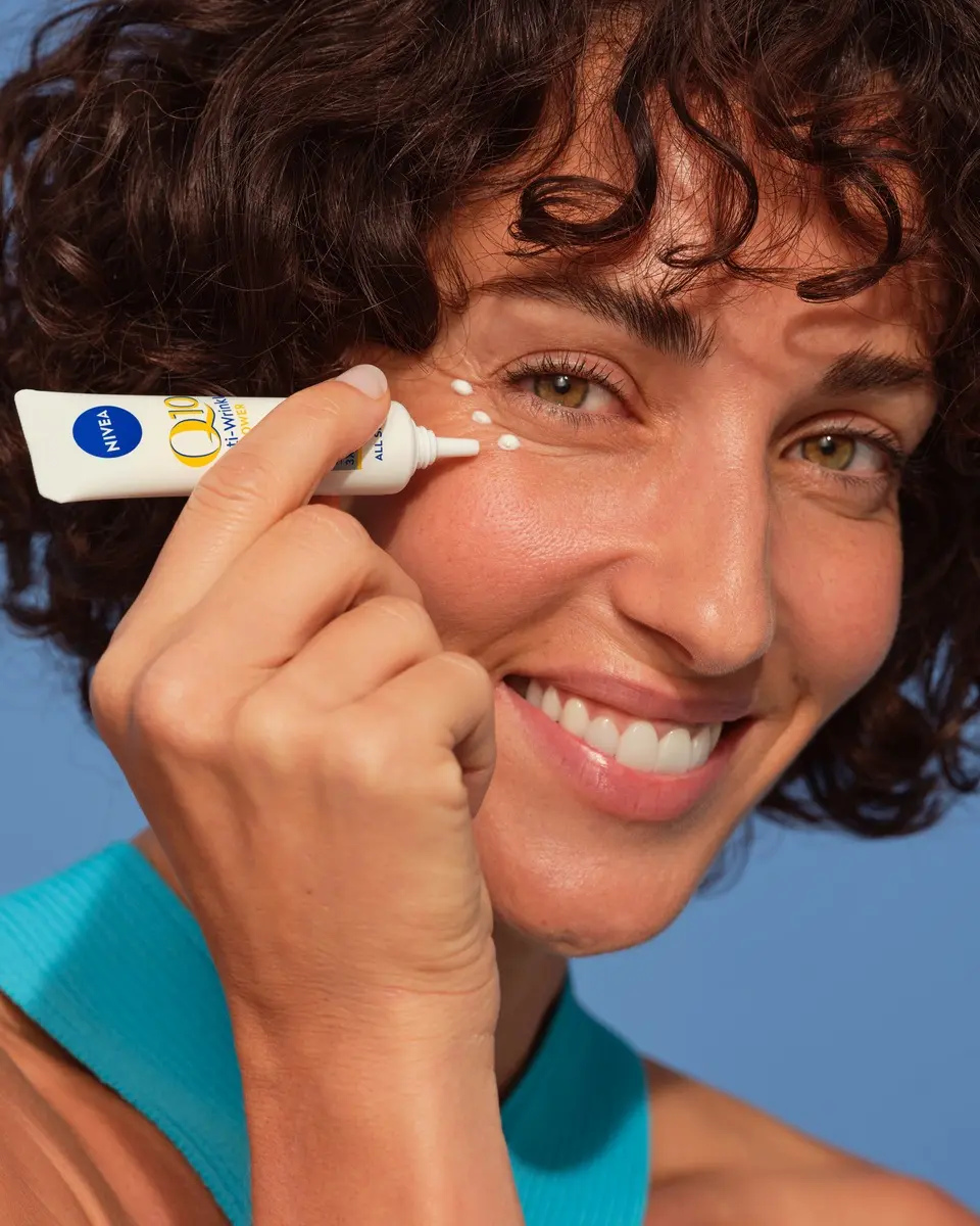 women using nivea q10 products on face