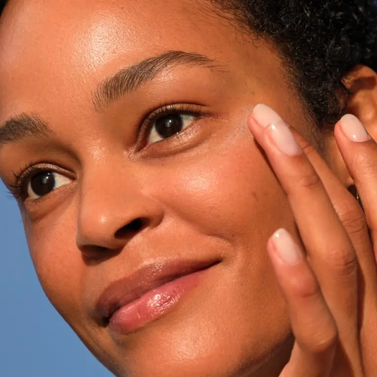 woman applying NIVEA Q10 power anti-wrinkle cream