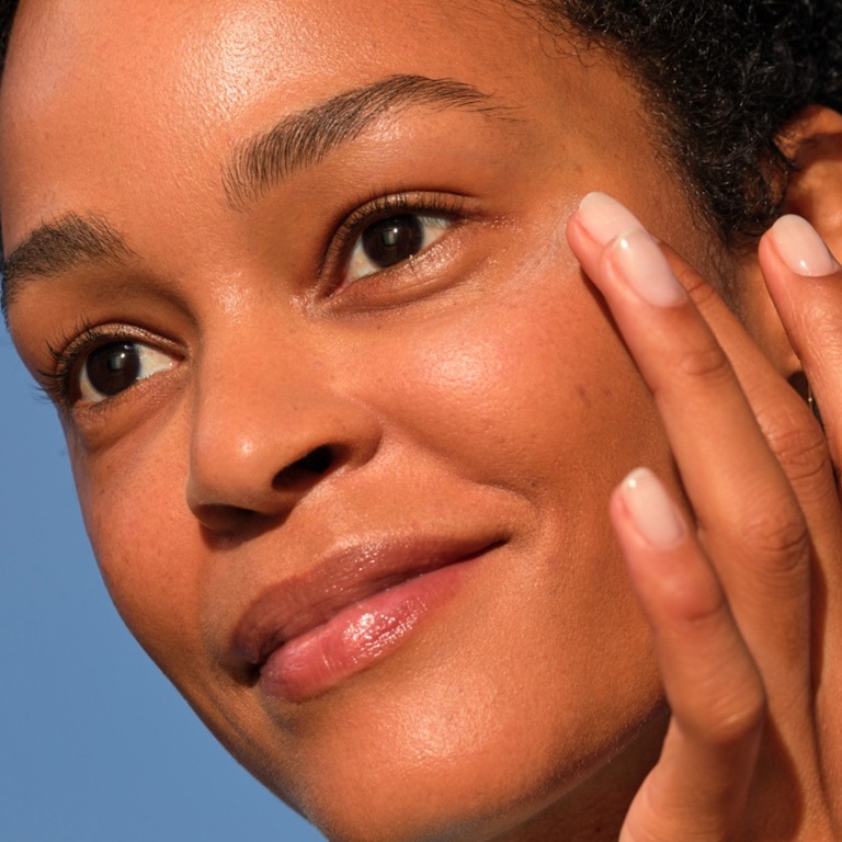 woman applying NIVEA Q10 power anti-wrinkle cream