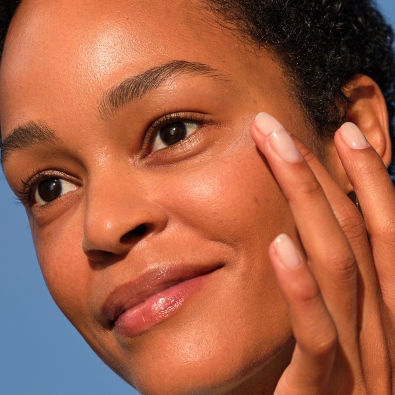 woman applying NIVEA Q10 power anti-wrinkle cream