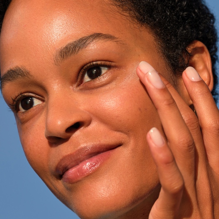 woman applying NIVEA Q10 power anti-wrinkle cream
