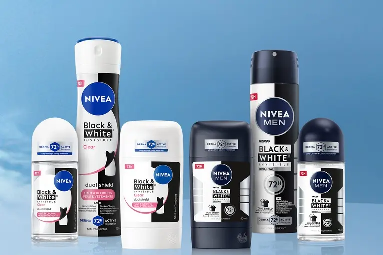 Display of several Black & White deodorants.