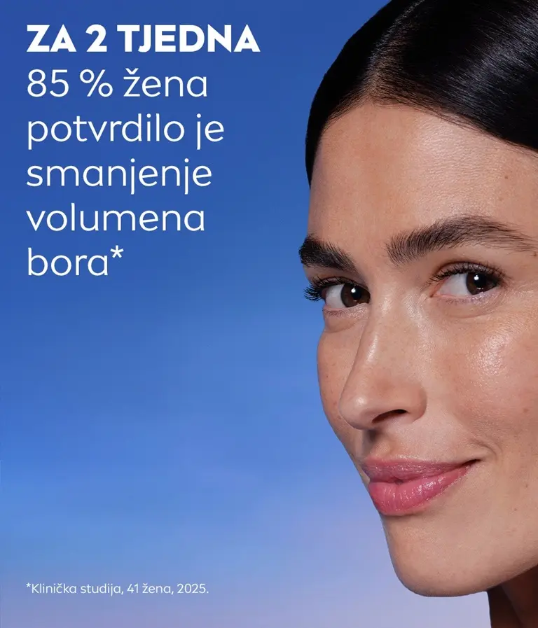 Žena se smiješi, samopouzdano gleda u stranu s obnovljenom kožom.
