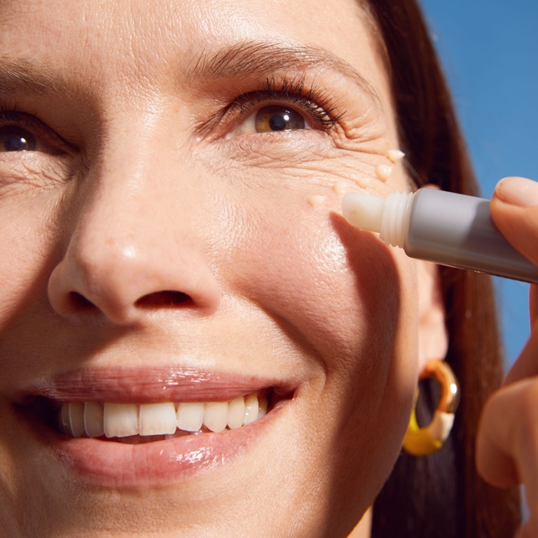 Close-up of woman's eye area showing fine lines