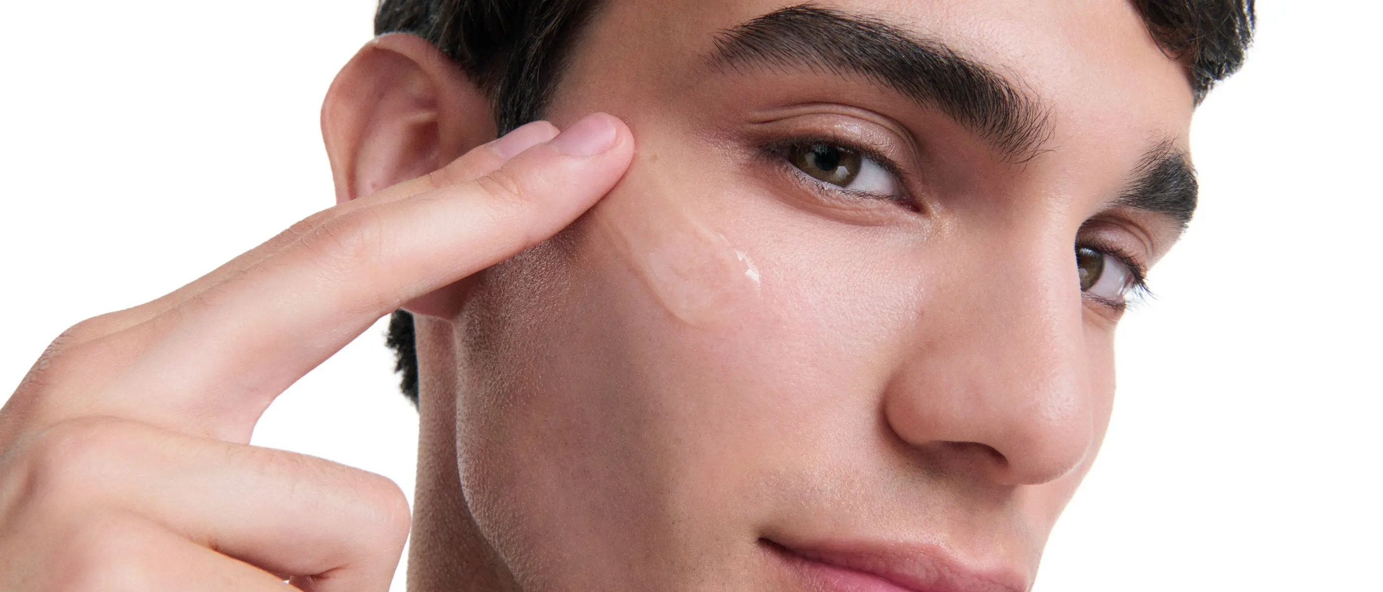 Man applying Eucerin Probiom8 product to blemished, acne-prone skin