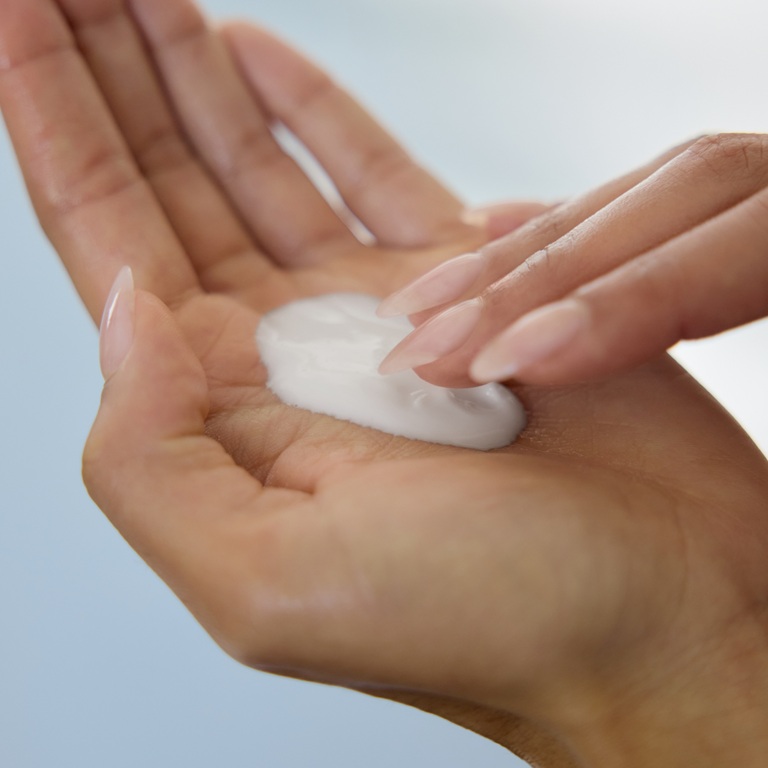 woman using vegan skincare shower gel