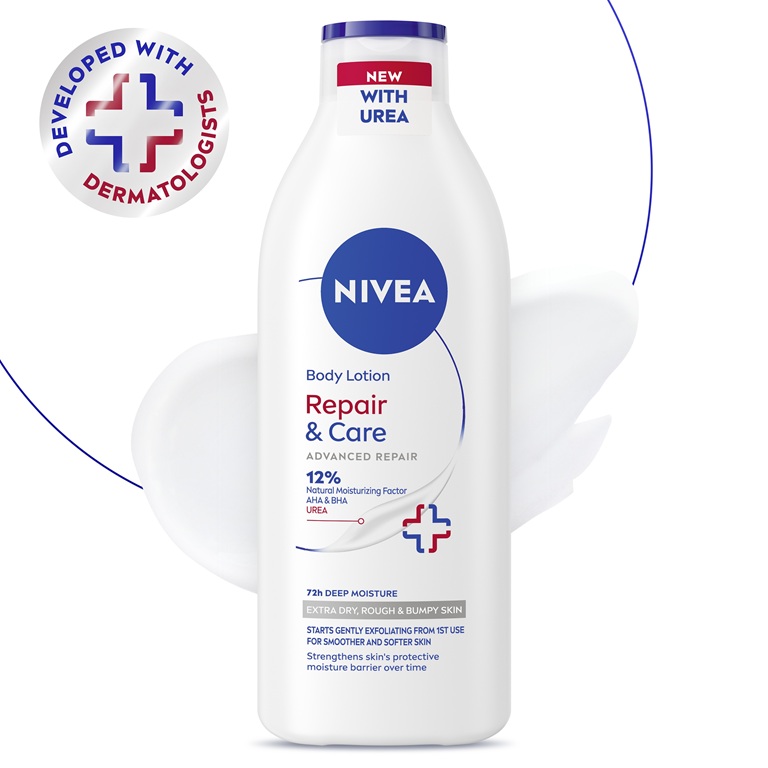 White bottle of NIVEA Repair & Care body lotion with 12% natural moisturizing factor, AHA, BHA and urea