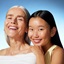 a young woman and an old lady smiling to the camera