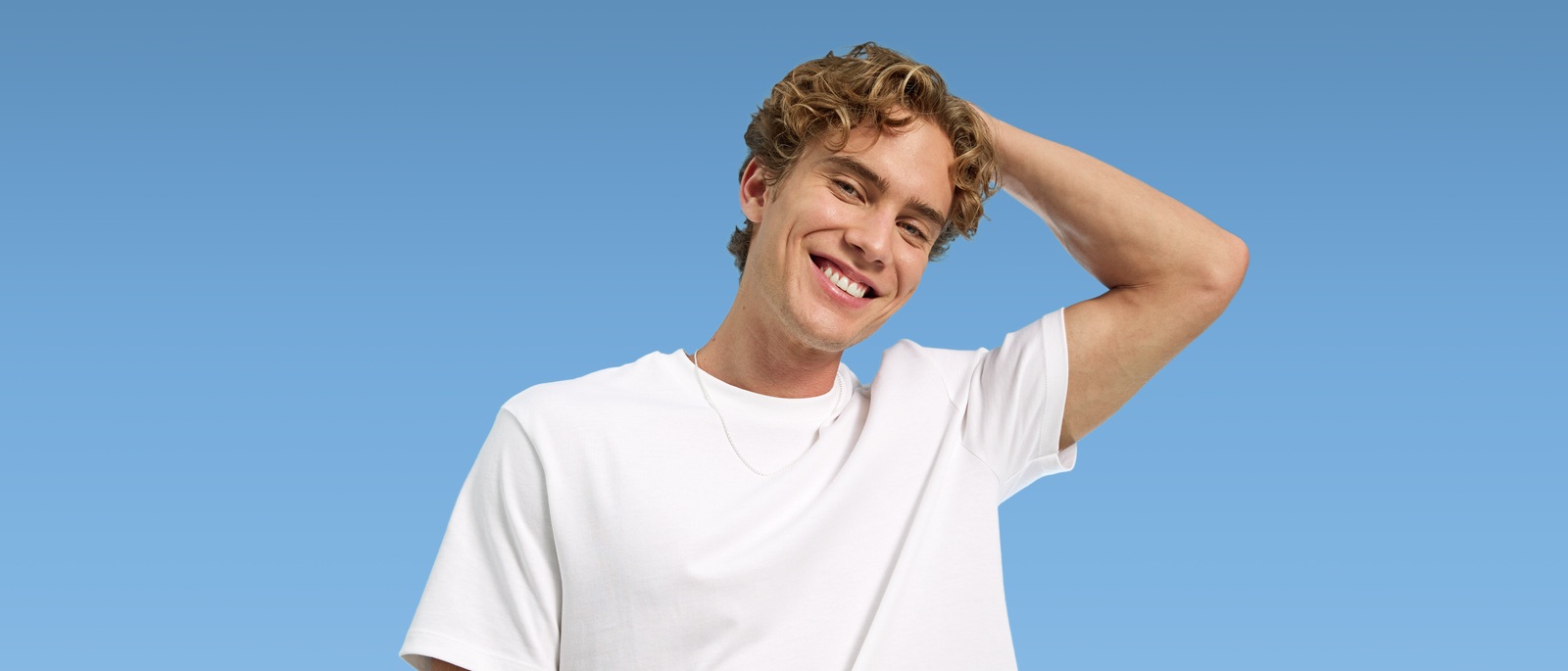 Woman using NIVEA Q10 Anti-Wrinkle POWER EXTRA FIRMING EYE CREAM