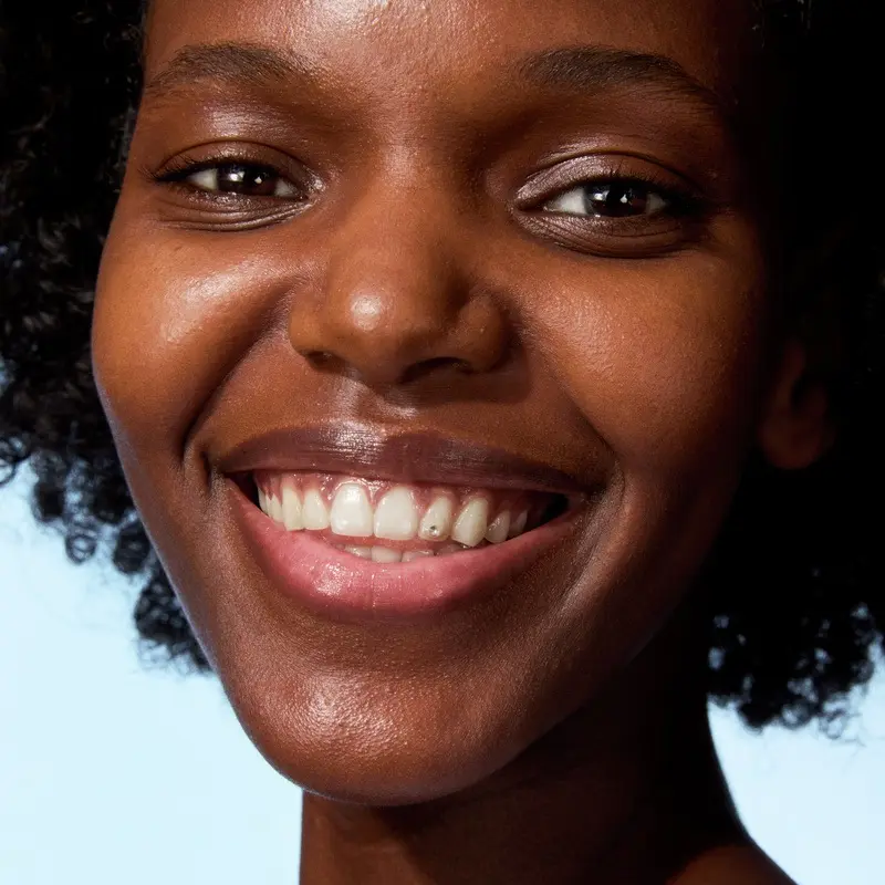 close up of a smiling young woman