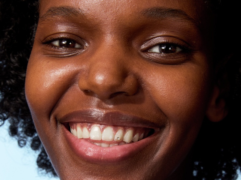close up of a smiling young woman