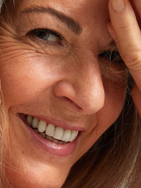 Woman using Nivea face cream