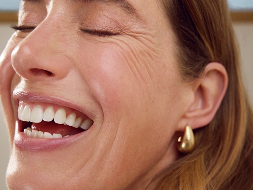 Woman using Nivea Q10 Anti-Wrinkle Power