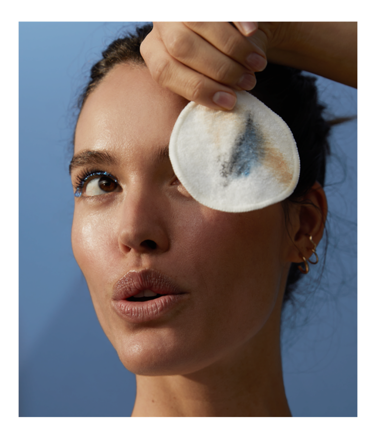 woman applying Micellar water brightening day