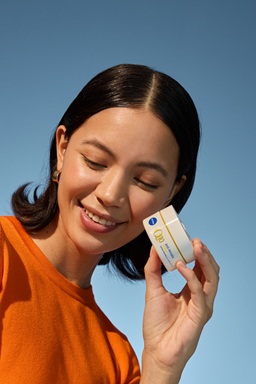 Woman using NIVEA Q10 Anti-Wrinkle POWER EXTRA FIRMING EYE CREAM