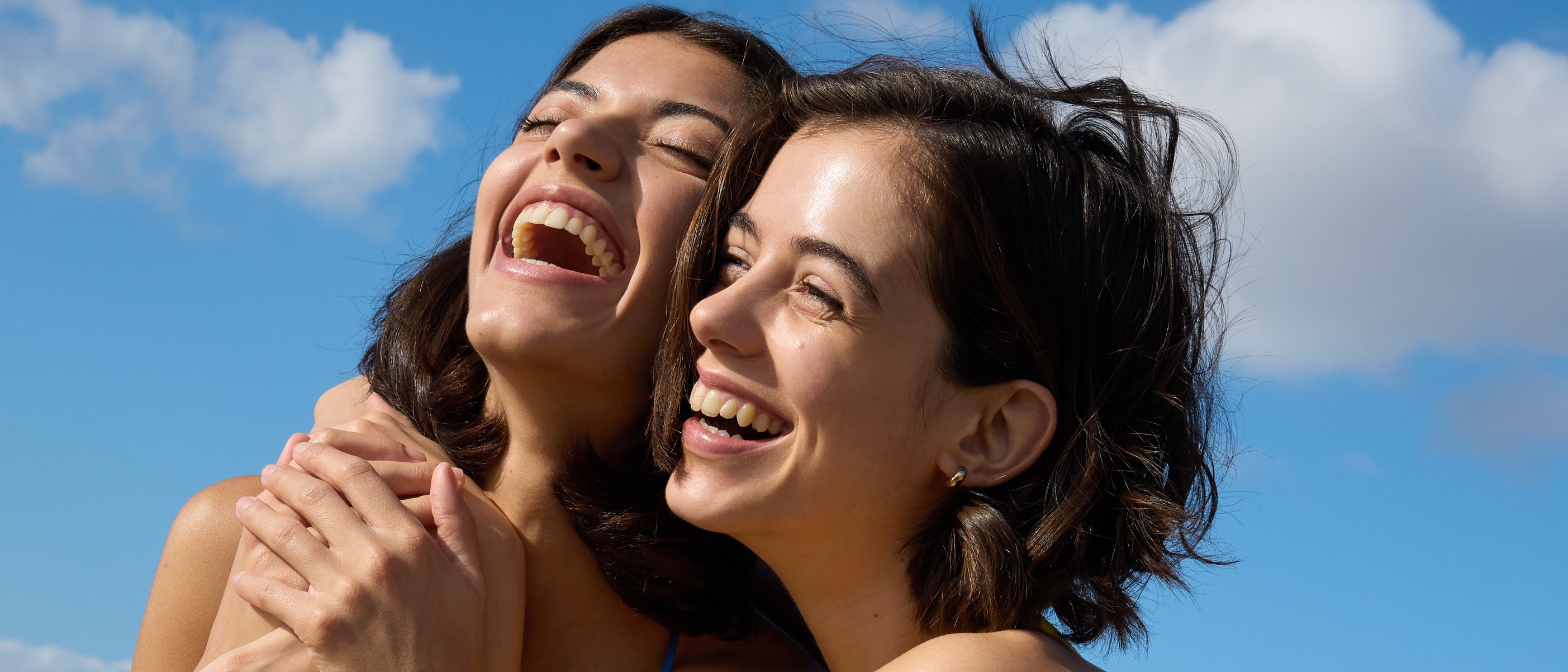 Two young girls who smile