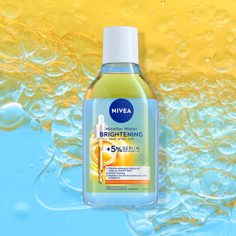 The NIVEA Brightening Serum-infused Micellar Water featured over a bright, bubbly yellow and blue background.