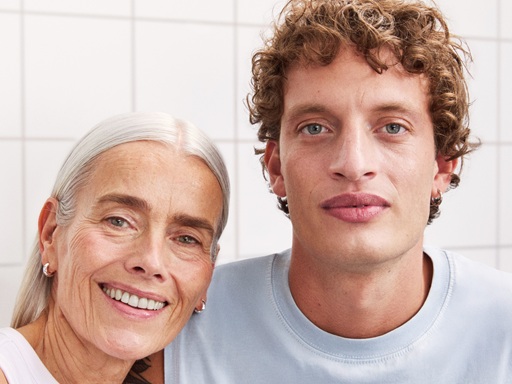 A woman and a man staring to the camera, with nice and bright skin