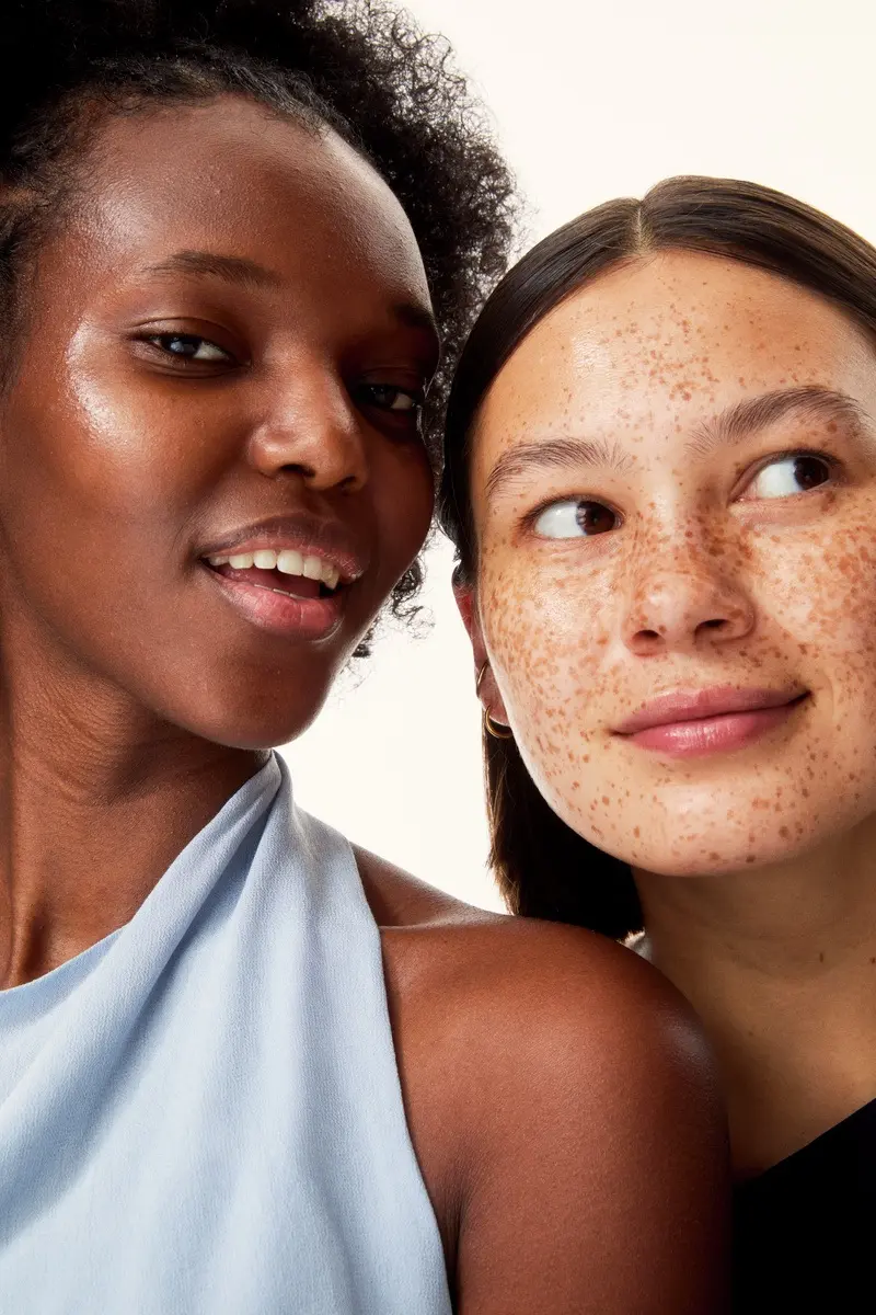 woman using Nivea Q10 anti-wrinkle serum