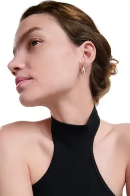 Woman with mild blemishes on acne-prone skin
