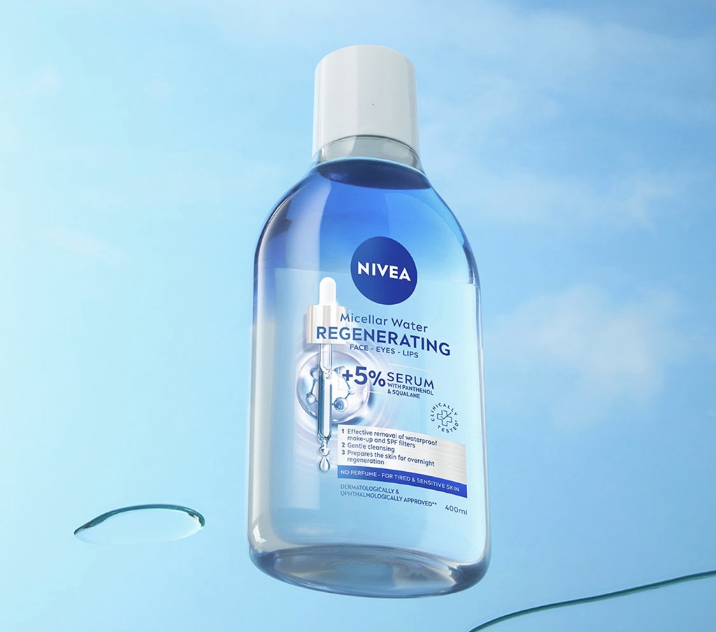 NIVEA Regenerating Serum-Infused
Micellar Water against a sky blue background
