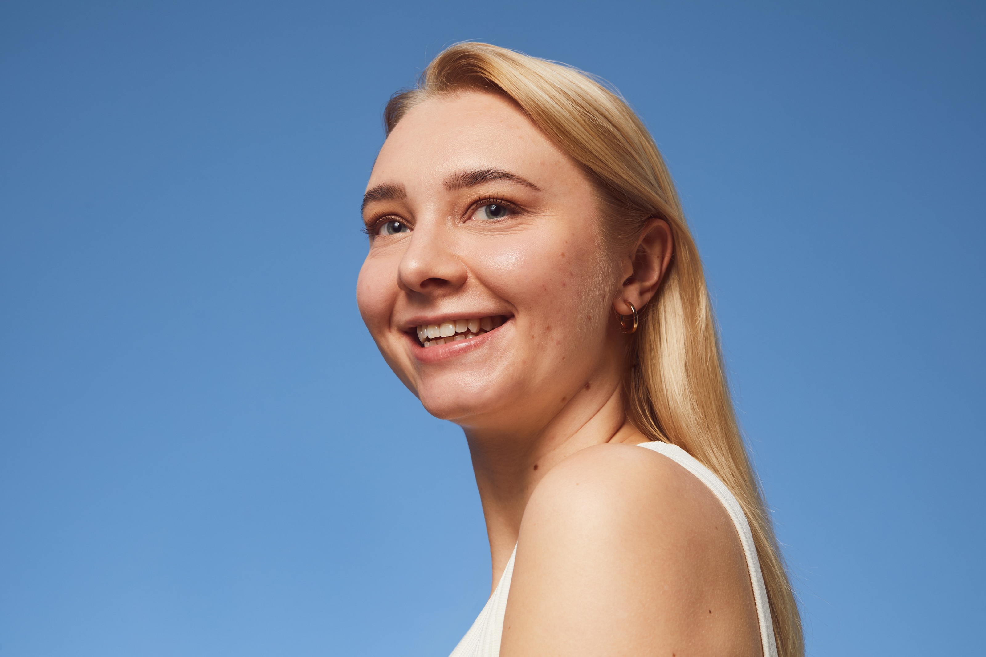 young woman who is smiling