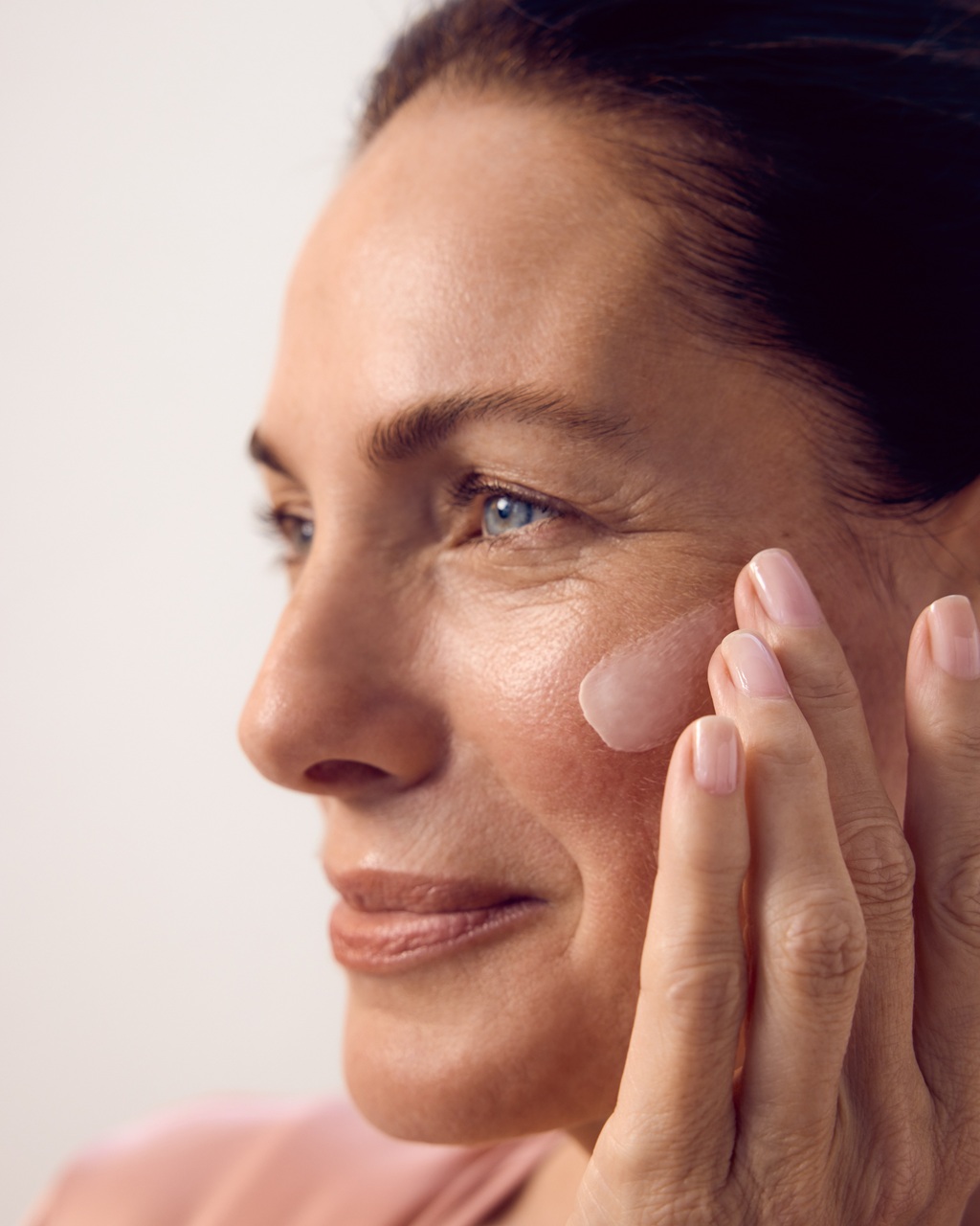Woman checking her skin