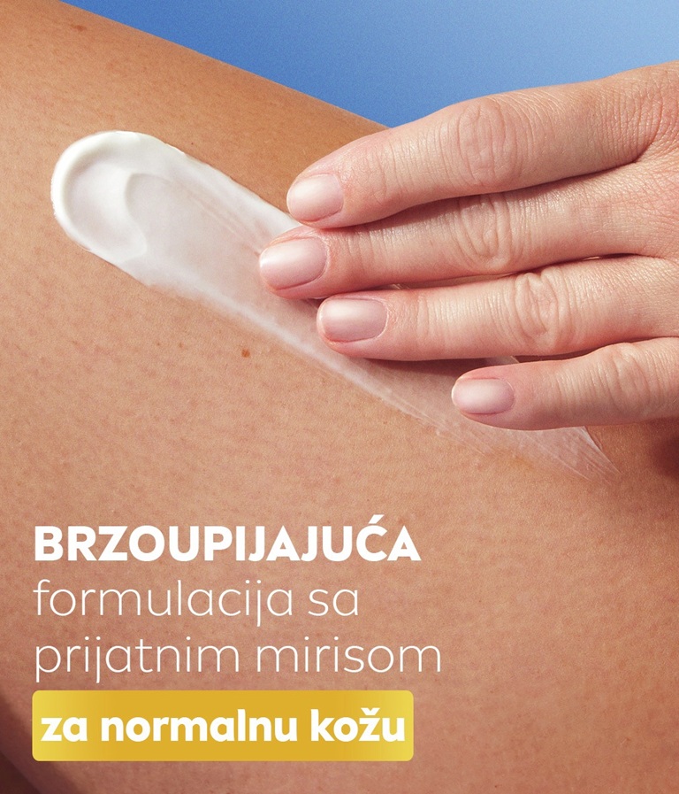 A hand swipes Q10 lotion which has fast absorbing formula