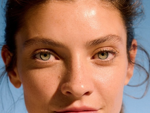 confident looking woman with blemish free skin