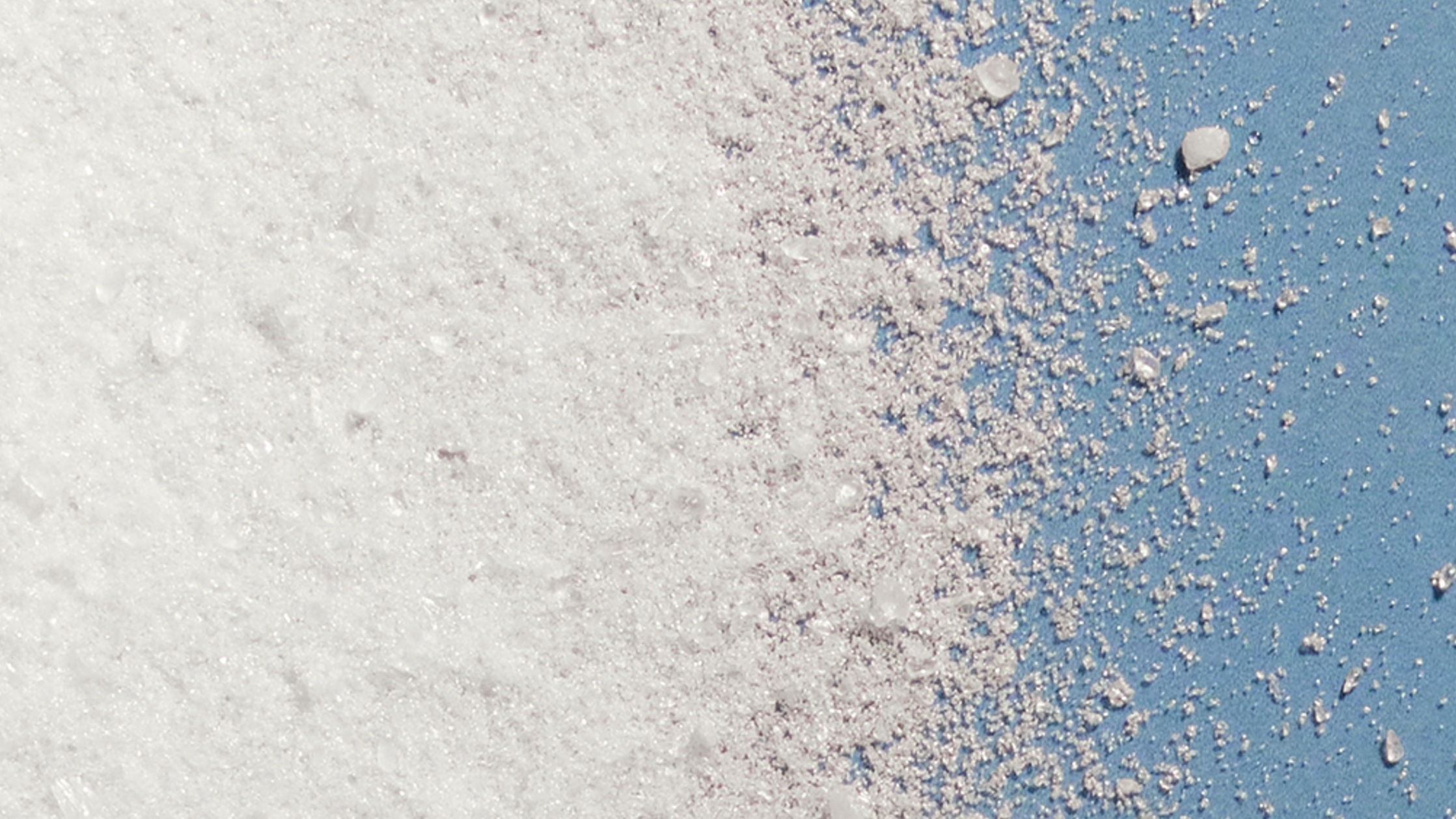 Young woman applying Nivea face serum